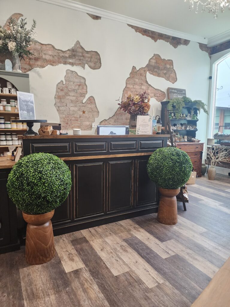 Customer service desk inside The Table Lady a custom furniture shop located in historic downtown Davisburg, Michigan